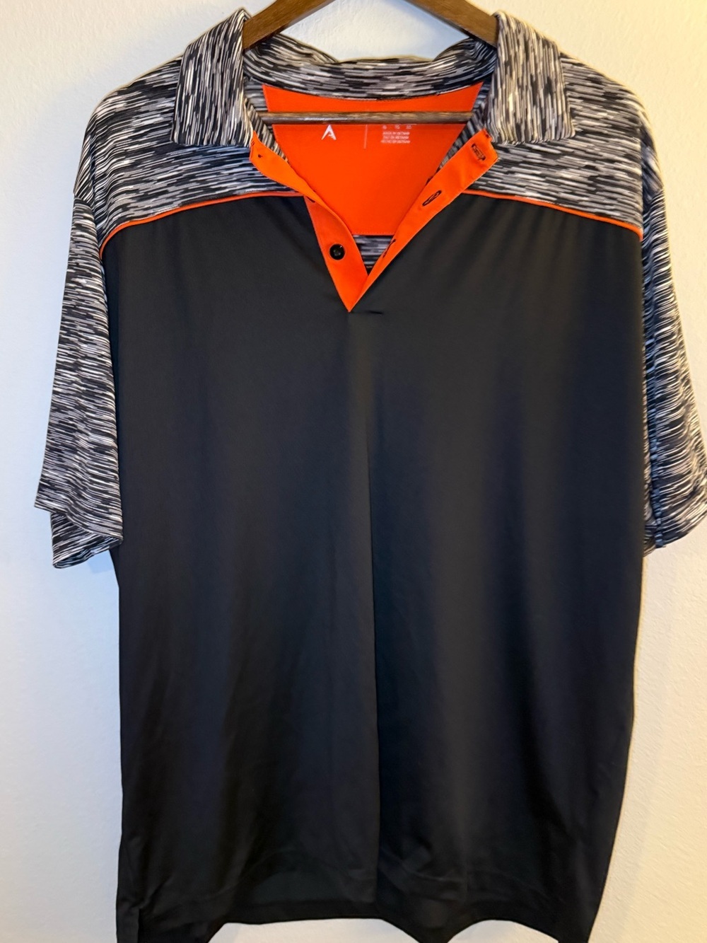 Antigua Black Polo with Heathered Gray Shoulders and Orange Placket